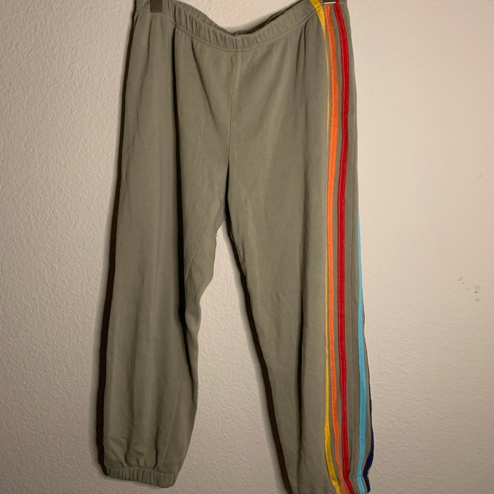 Rainbow detail, green sweatpants